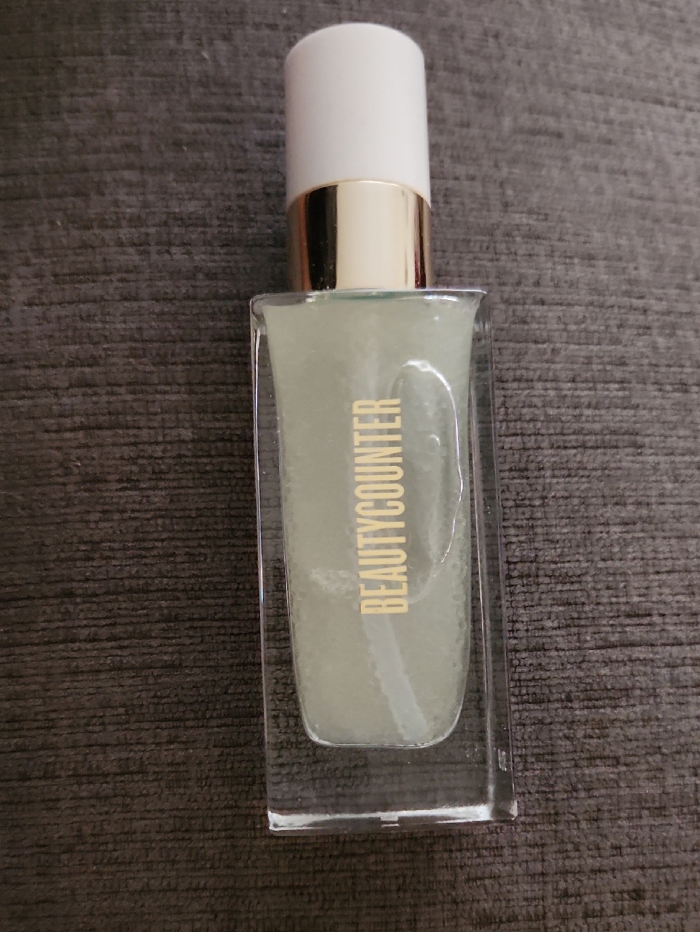 Beautycounter Serum Bottle in Mint with White and Gold Cap